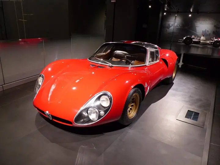A red Alfa Romeo 33 Stradale